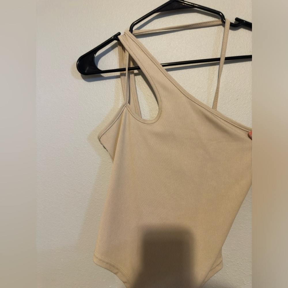 Never worn body suit